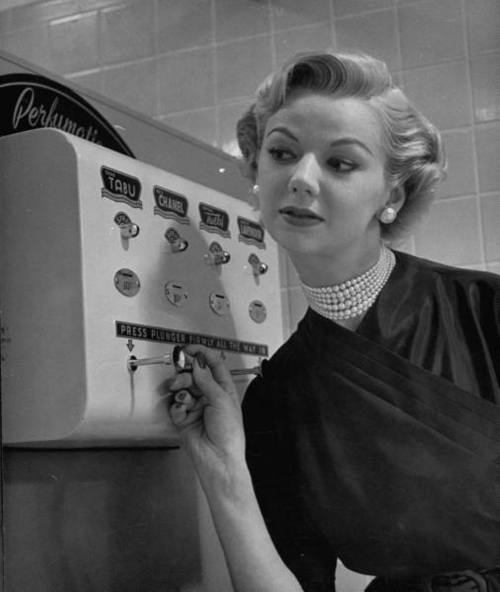 coin-operated-perfume-dispenser-1952